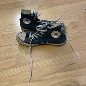 Classic blue ankle high converse.
